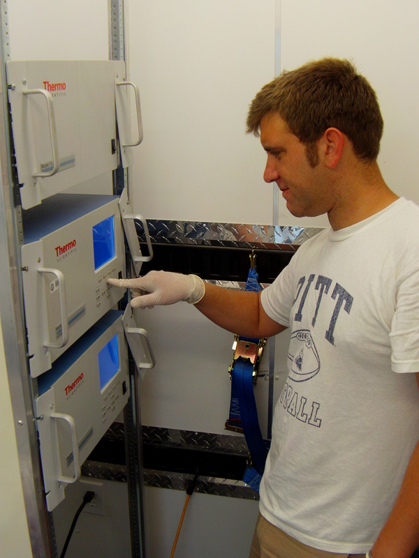 Student utilizing the mobile air quality research lab