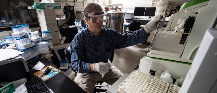 Man in laboratory.
