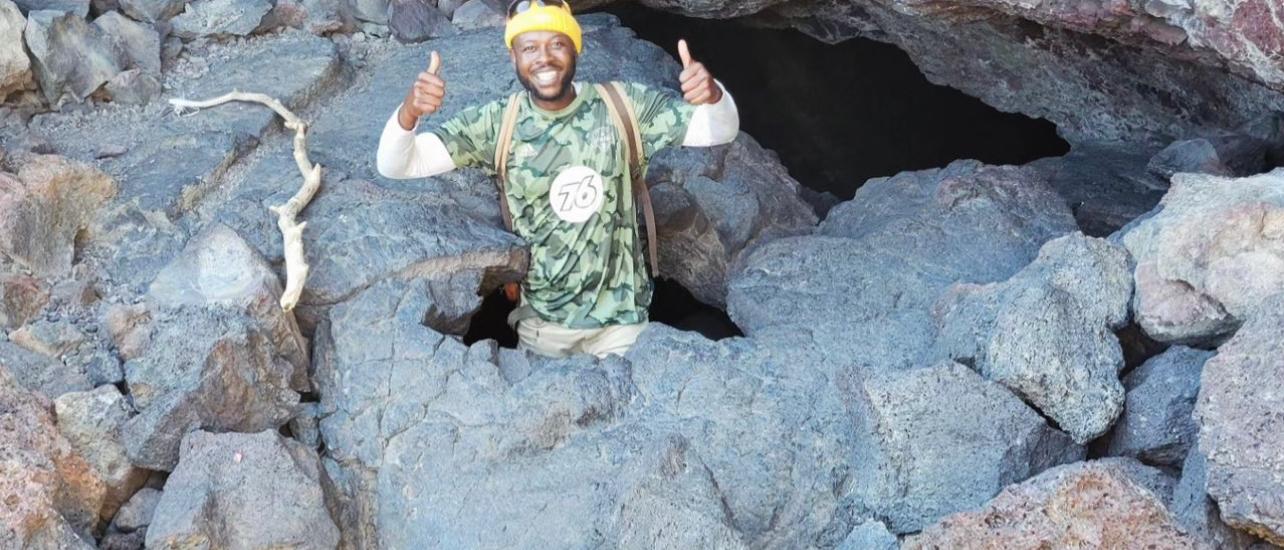 Man in cave.