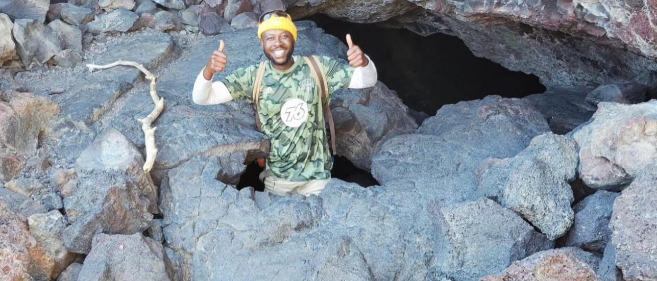 Man in cave.